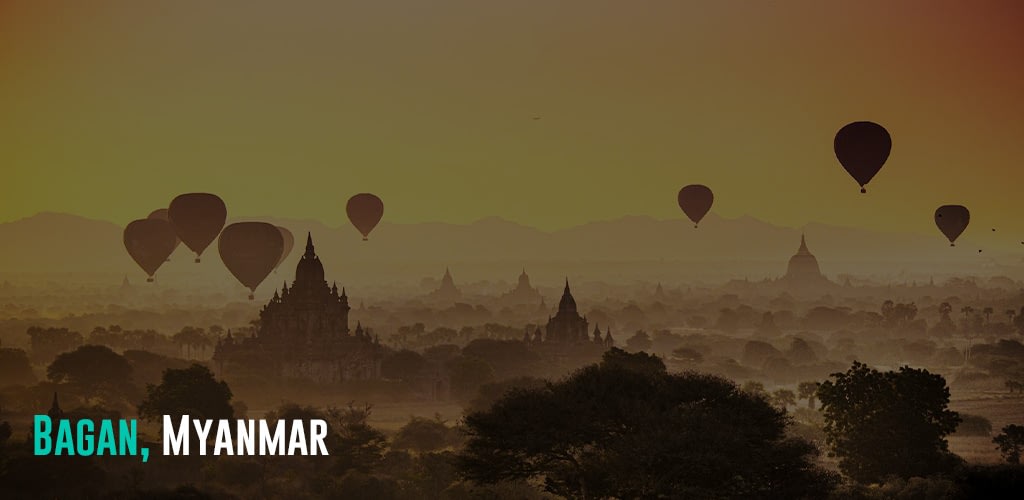 silhouettes of hot air balloons flying in the sky as the sun sets