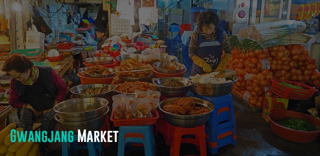 some ladies selling and making Kimchi