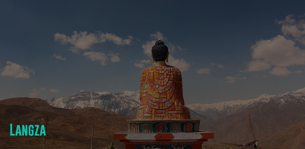 the back of the mammoth Lord Buddha with a view of the mountains