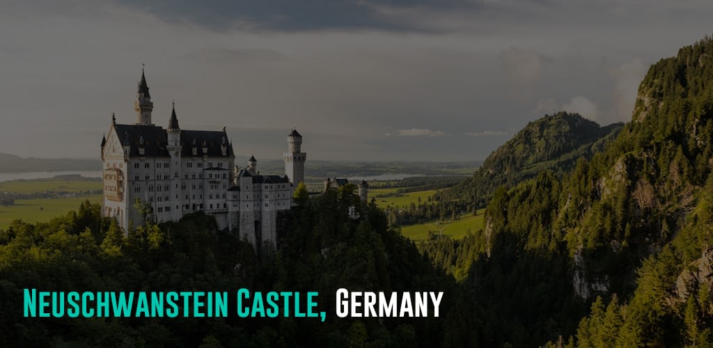 a white castle on top of a mountain