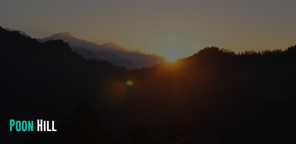 sun setting with a view of a mountain with dense forest 