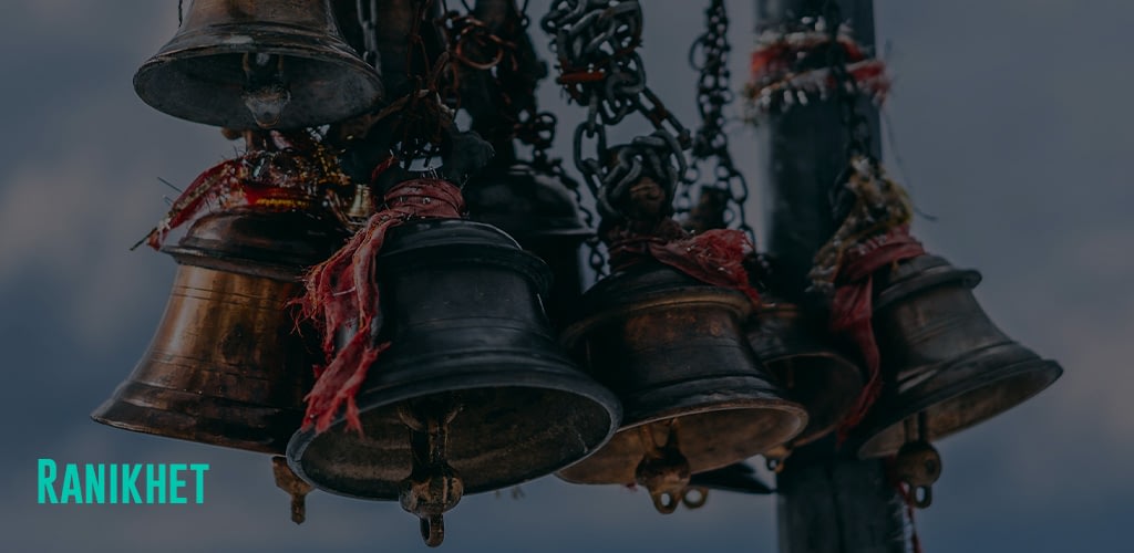 a photo of a bunch of bells hanging