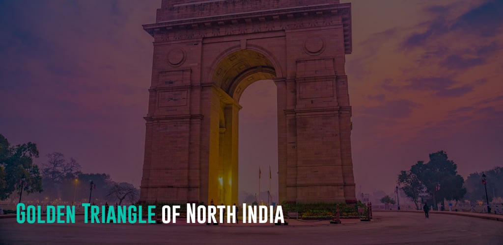 a view of the India Gate during sunset