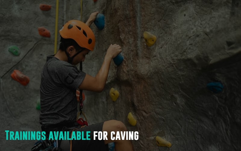 A person training for cave climbing