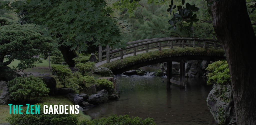 A lake bridge located in a peaceful-looking garden.