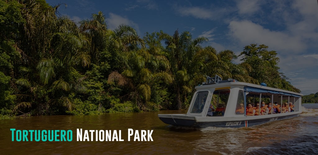 Boat trip filled with tourists in Tortuguero National Park canals, Costa Rica
