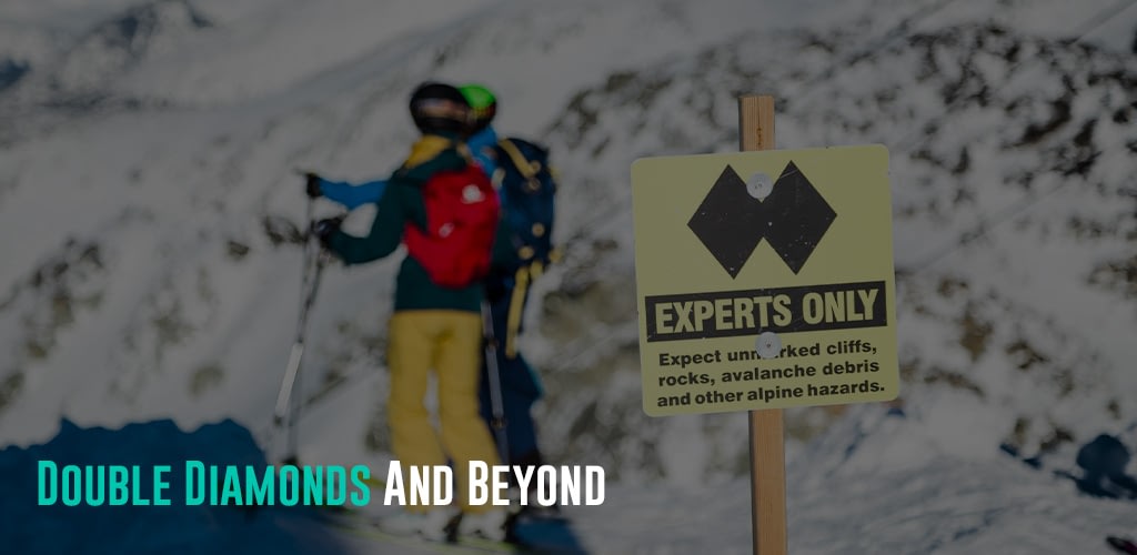 a signage of double diamond and 2 skiers at the background