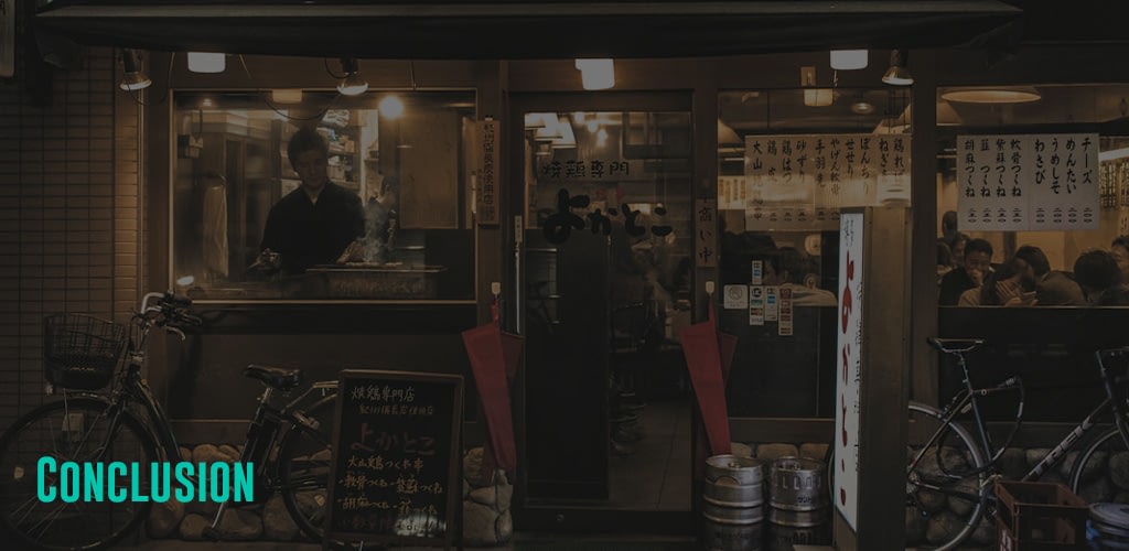 front of a restaurant with many customers inside and a man cooking