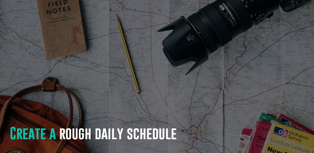 A map, pencil, notebook bag, magazines, and a camera,