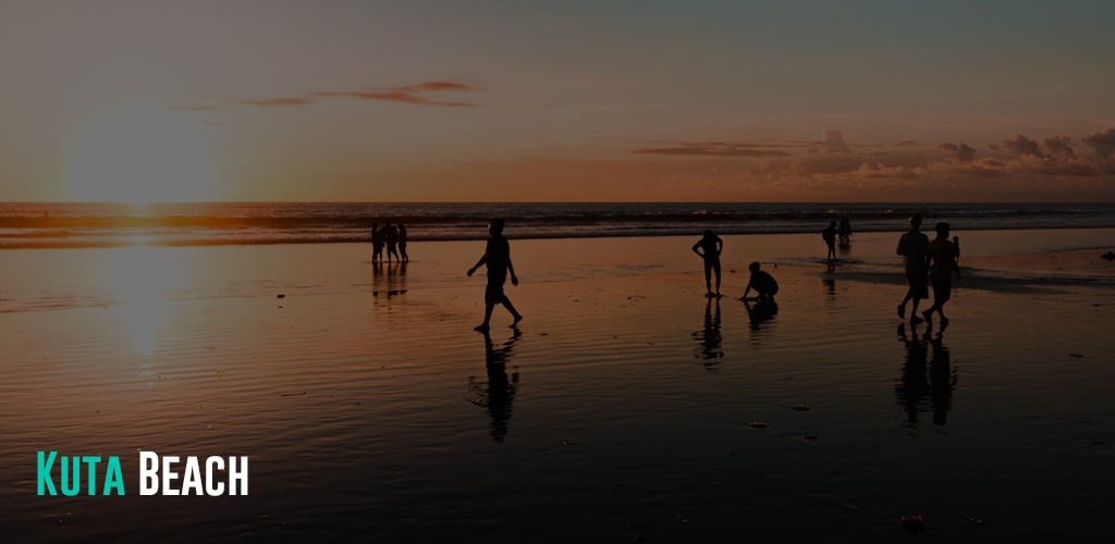 people enjoying the beach during the sunset