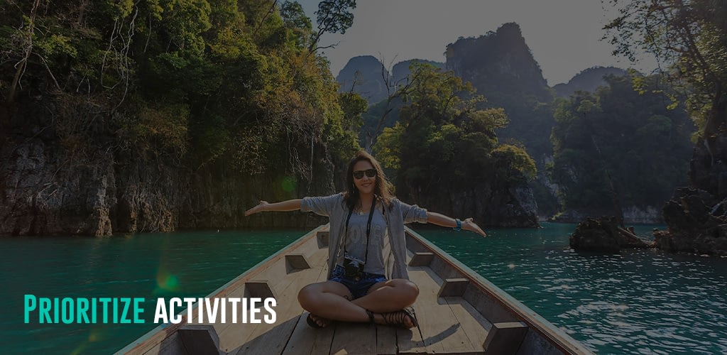 a lady on a boat in the middle of a beautiful view of the rock islands
