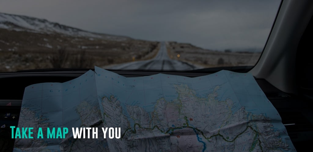 a person using a map while on the road