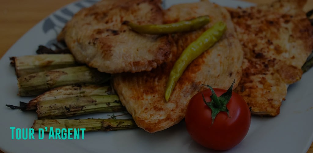 Pan fried chicken with some veggies and chilies 